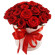 red roses in a hat box. Perm
